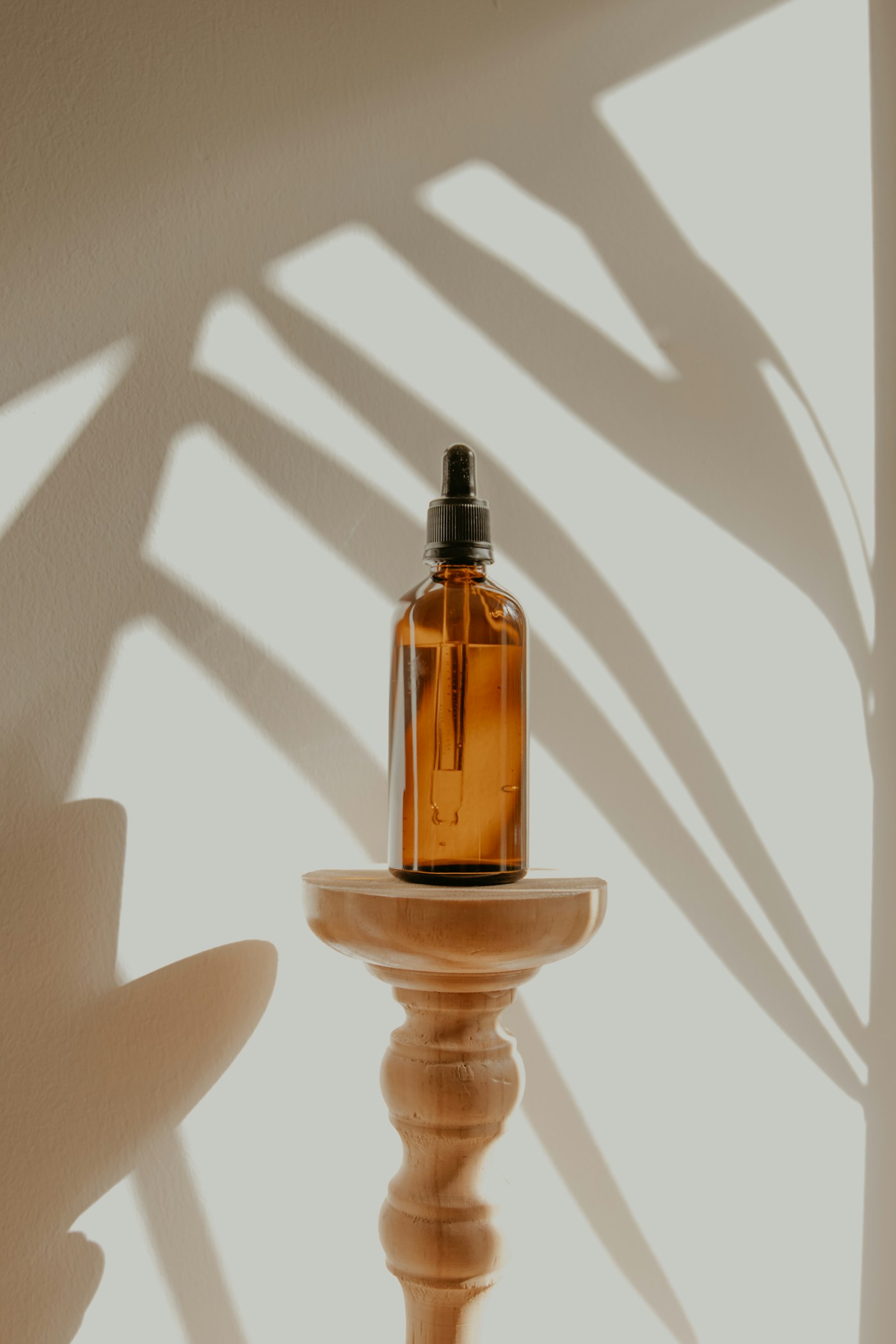 Skincare objects arranged in soft light