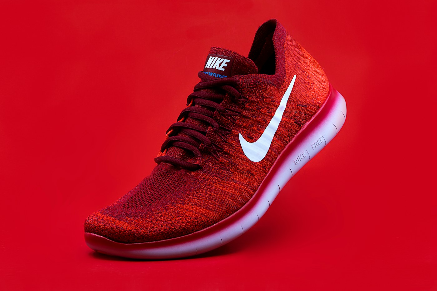 A red trainer in an editorial product study
