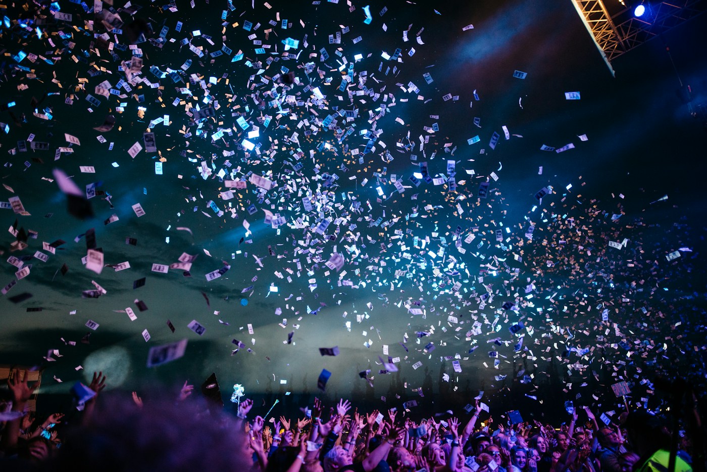An outdoor gathering with warm string lights