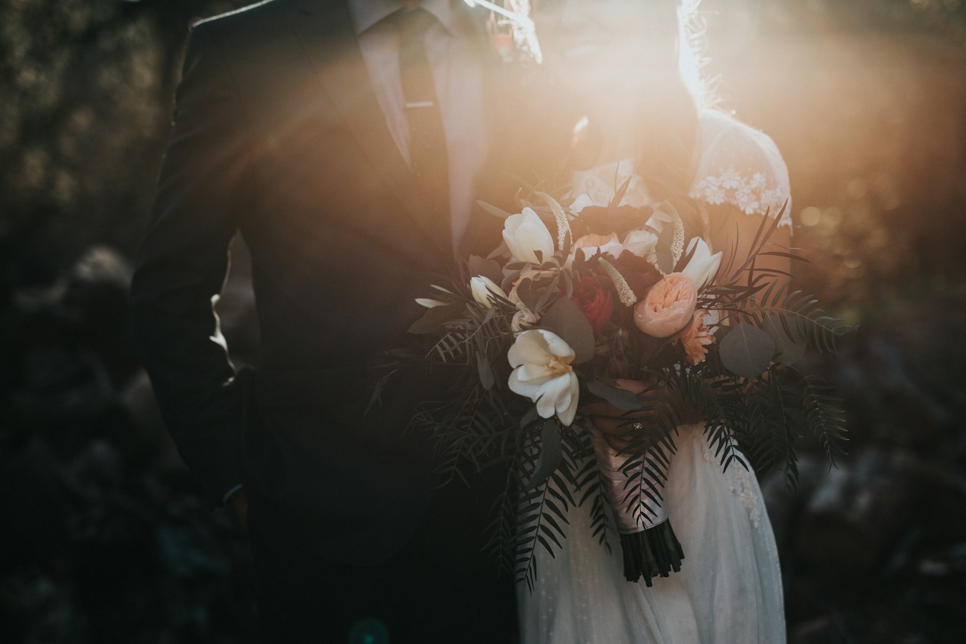 An outdoor wedding celebration in warm light